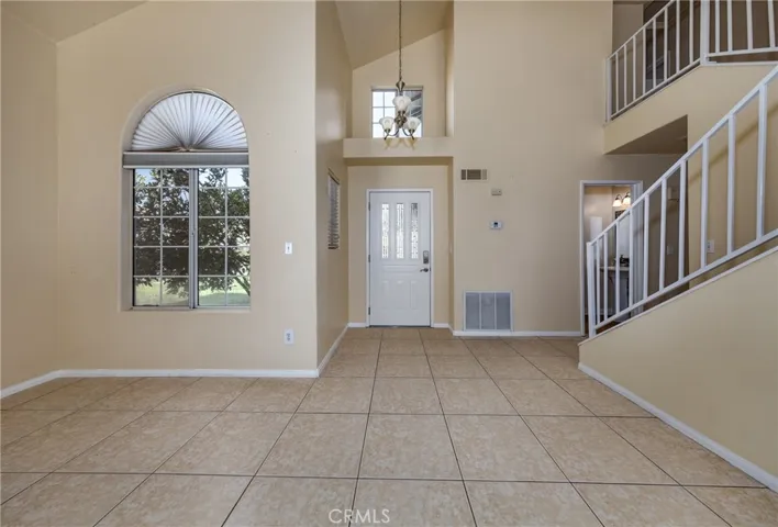 Living room looking to front door