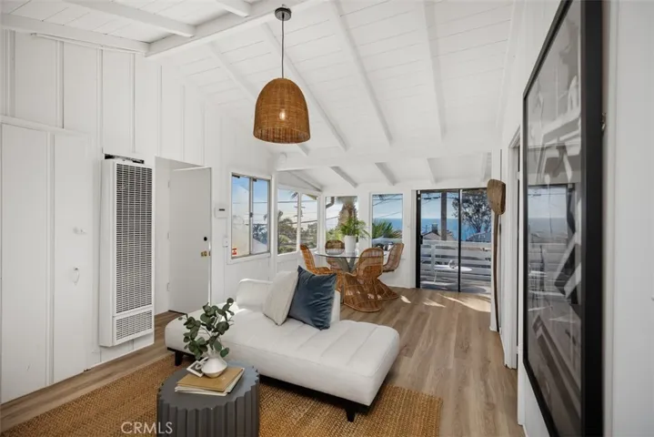 Upstairs Unit Living Room with Fireplace & Ocean + Catalina Island Views