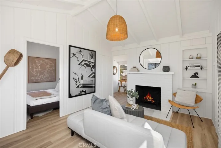 Upstairs Unit Living Room with Fireplace & Ocean + Catalina Island Views