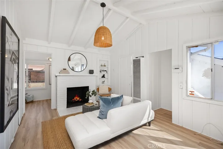 Upstairs Unit Living Room with Fireplace & Ocean + Catalina Island Views