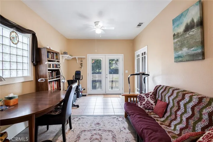 3rd bedroom has separate entrances which include access to carport and front yard area. Located on other side of two other bedrooms. Could be used as an ADU setup.