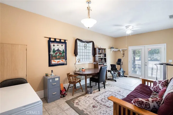 3rd bedroom has separate entrances which include access to carport and front yard area. Located on other side of two other bedrooms. Could be used as an ADU setup.