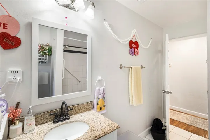 Nice recently remodeled hallway bathroom.