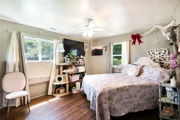 Spacious Bedrooms with central venting, Original hardwood Floors and Double paned windows!