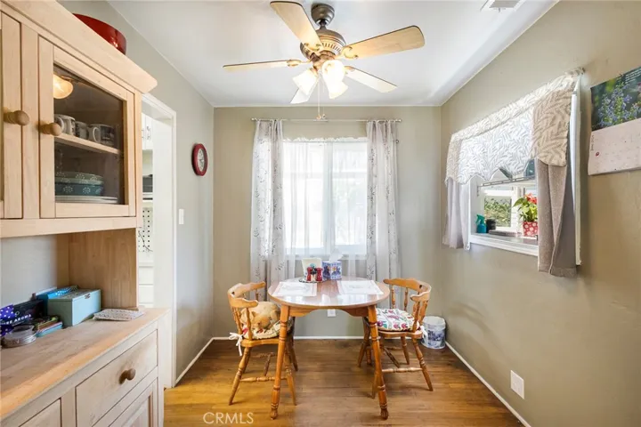 Nice Dinning Area, Most of the home has original hard wood Floors and double paned windows.