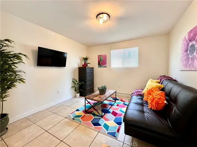 Front part of garage conversion as TV room/Den