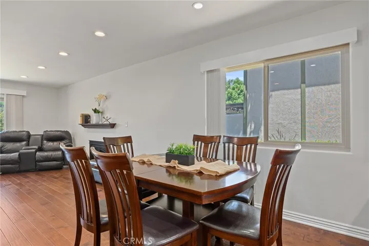 Dining area with window looking out to private community greenbelt