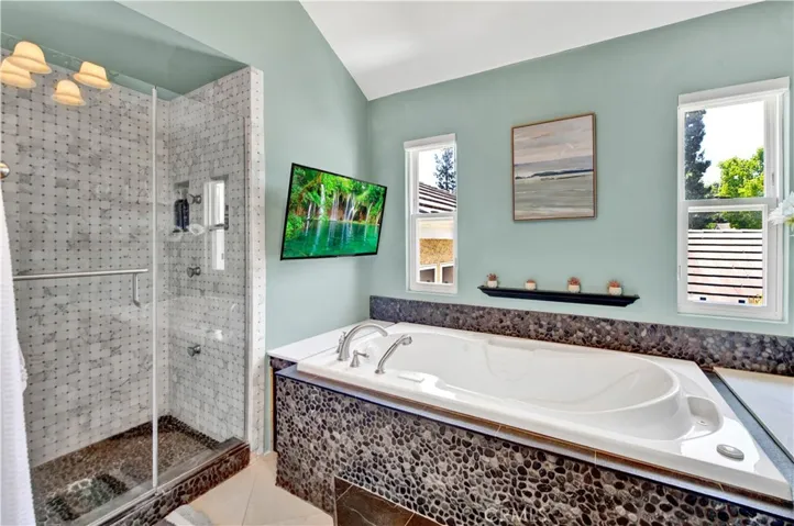 Beautiful custom rock bathtub with jets