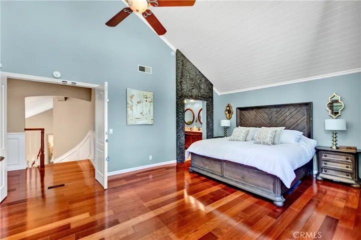Ceiling fan and beautiful custom rock wall
