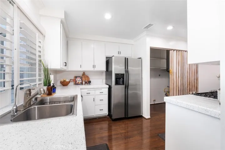 Kitchen w/ washer dryer hook ups inside unit