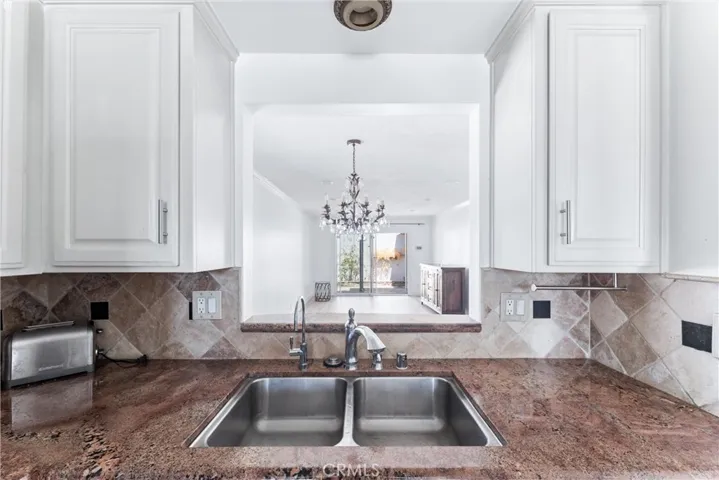 Sink and prep space with view into living area