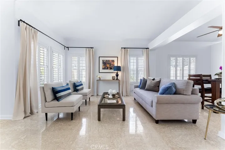 Upon entry, you will find the formal living room, open to the formal dining room.