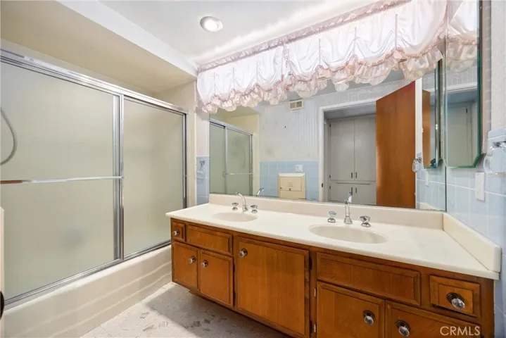 Upstairs Bathroom with double sinks/shower and bathtub, separate toilet