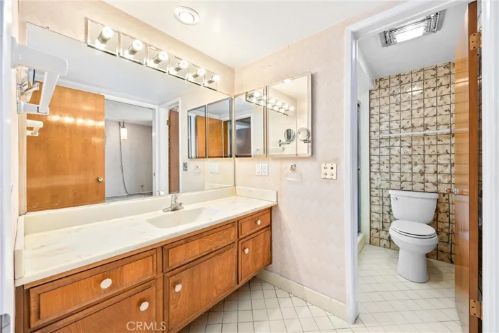 Upstairs Bathroom with double sinks, separated toilet