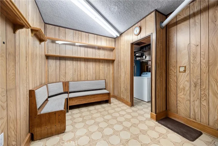 This room is built in the 3rd car garage with access to house. Can be an office or man cave