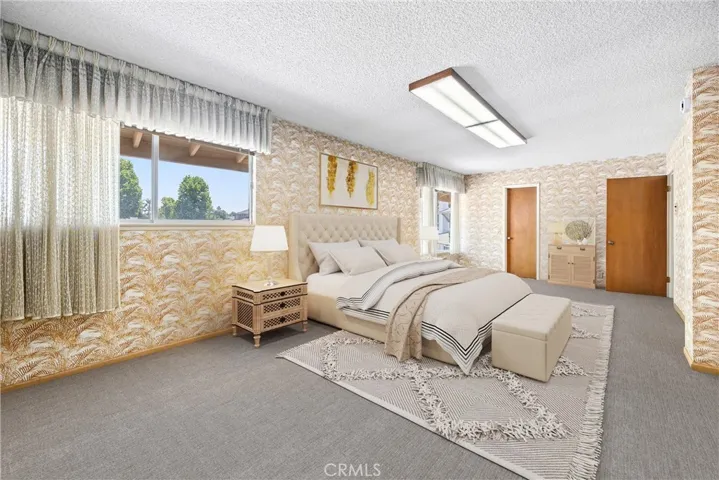 Virtually Staged upstairs bonus room or Master Bedroom, originally built as 2 separate bedrooms each with closet, just need to add dividing wall. Still Has 2 closets one on each side.