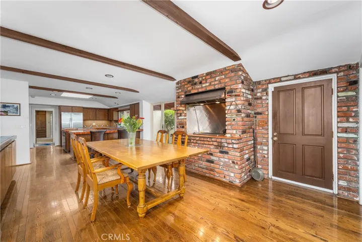 Entertainers kitchen with indoor grill and seating area