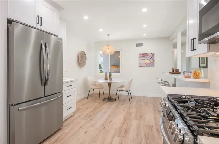 Gas cooktop. Refrigerator included.