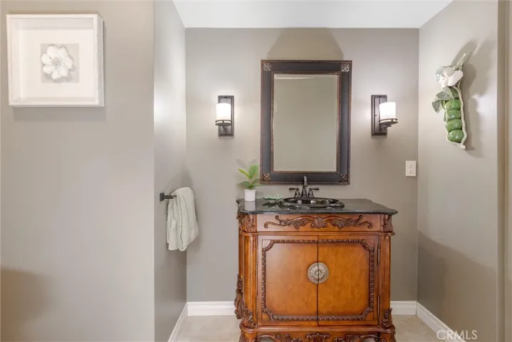 Lower level Powder Room with access to the side yard just off the greatroom.
