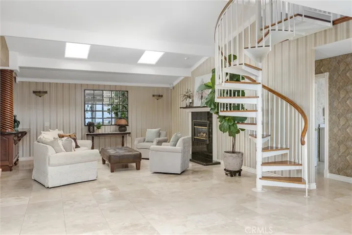 Lots of room to create a separate media, TV space and additional sitting area.