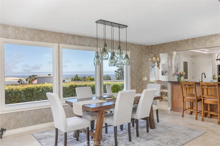 The dining area and adjacent gourmet kitchen await your creations! The favorite gathering spot in the house for family and parties for sure.