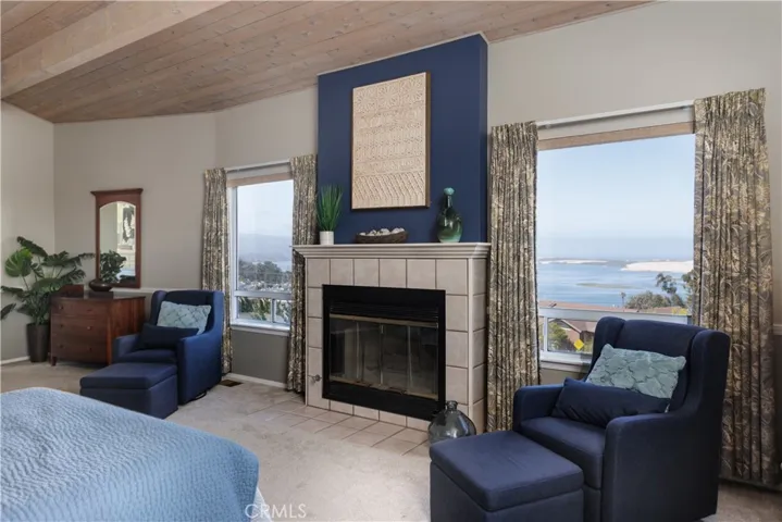Expansive master suite with an adjacent loft area envelopes the entire upstairs! You can see all the way to Montana del Oro from this location.