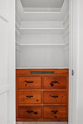 Pantry with original knotty pine drawers.