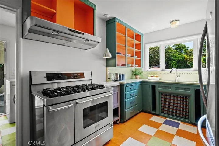 Love the playful vintage feel of this kitchen.