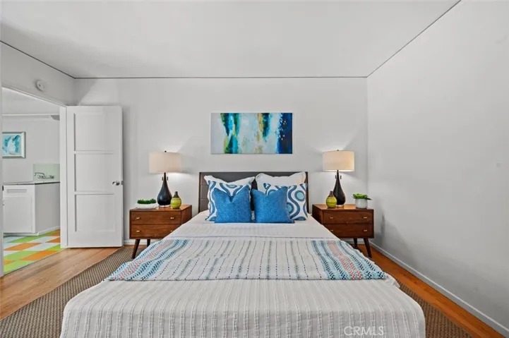 Main bedroom with door to laundry and 3/4 bath beyond that.