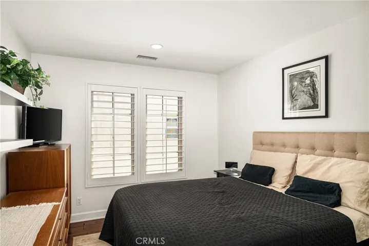 guest bedrooms are each bright and spacious, with built-in shelving