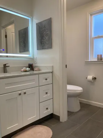 Bathroom was redesigned to have a private wash closet