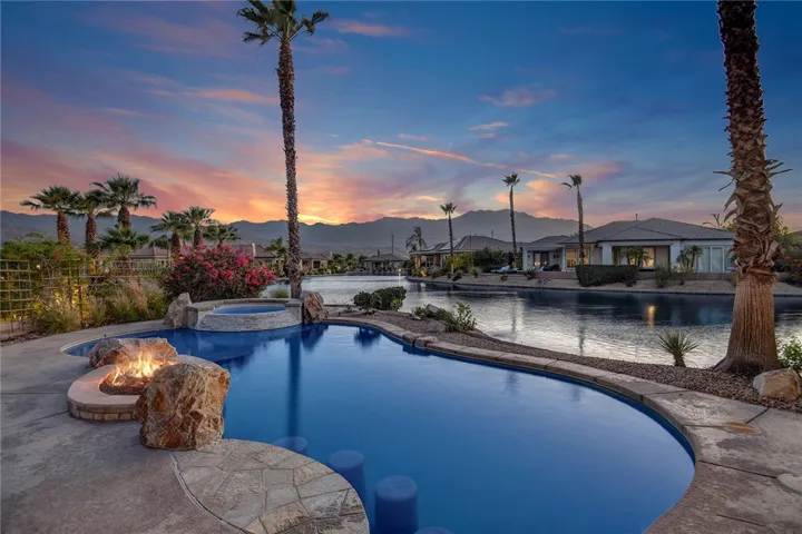 bar deck, with sitting and fire pit at dusk
