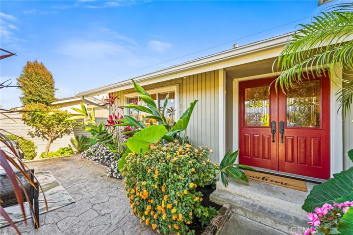 Private Front Gated Patio with Stamped Concrete Decking  - Step Through the Double Entry Doors with Beveled Glass