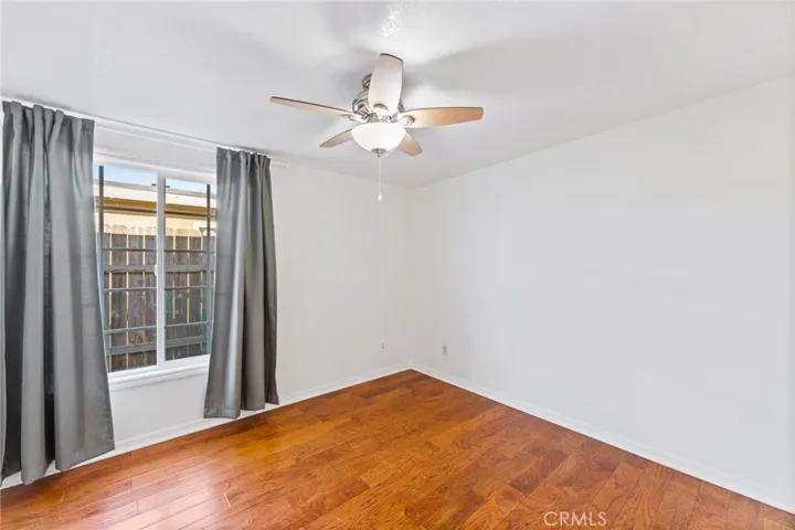 Bedroom #4 Downstairs
has Hardwood Floors, Mirrored Closet Doors and Ceiling Fan