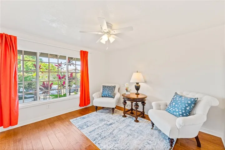 Spacious Bedroom #3 Downstairs has Hardwood Flooring Mirrored Closet Doors & Ceiling Fan