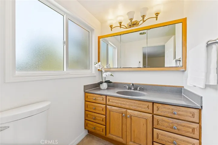 Downstairs Primary En- Suite Bathroom with Walk-In Tiled Shower