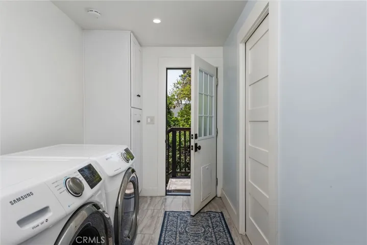 Indoor Laundry Leading to Backyard