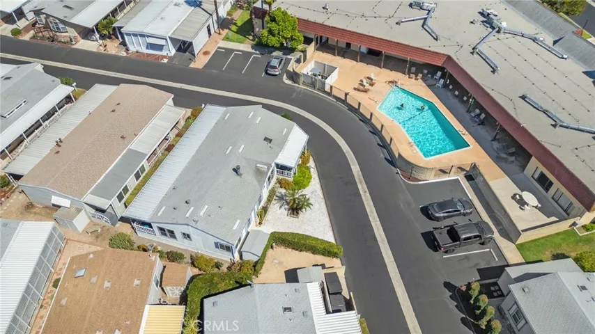 Home is just across from clubhouse pool on corner lot