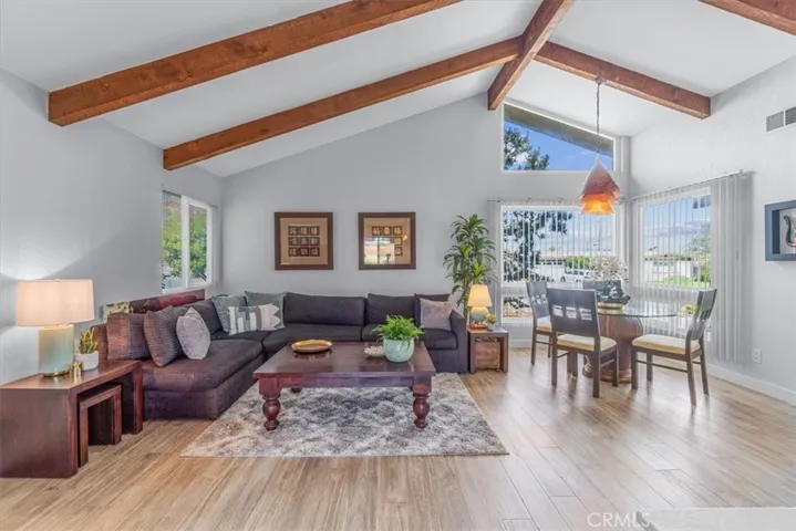 Distressed hardwood floors in the main living areas.