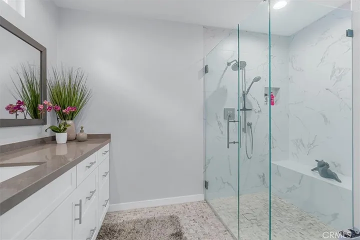 Spa like primary bath with roll in shower, no steps!