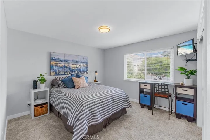 Guest bedroom is warm and inviting.