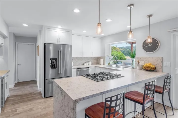 Newer lighting and fixtures throughout