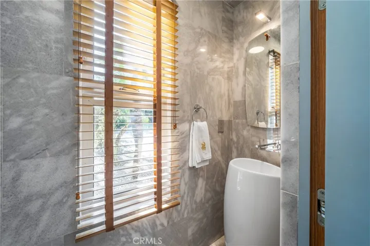 HALF BATH TUCKED AWAY IN KITCHEN