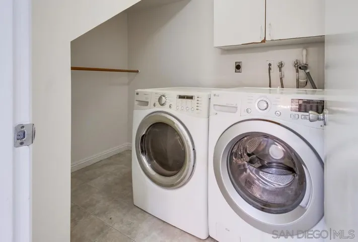 Inside laundry room with extra storage!