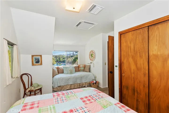 Upper left bedroom with lake views