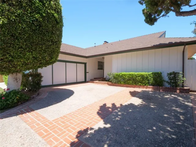 Continue the tour to  the wonderful front freshly painted exterior in white with green trim.