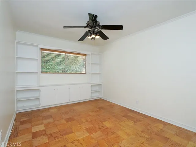 Bedroom 3 with built-ins, dark color ceiling fan and refinished floors and fresh paint