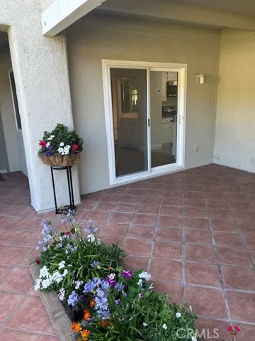 Four Upgraded Sliding Doors to Front & Rear Patios