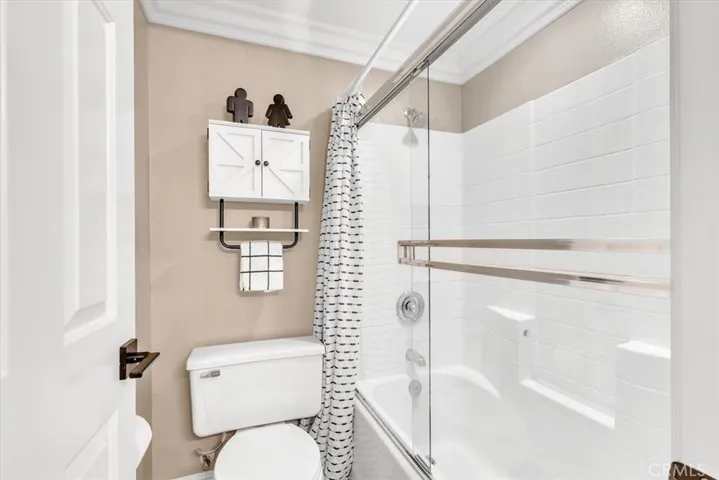 Bath 3 includes a shower-tub combo with glass enclosure.
