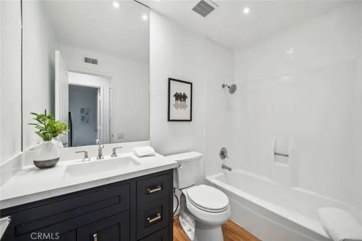 The guest bath has been remodeled as well, w/ custom, neutral finishes